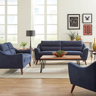Navy couch in bright living room